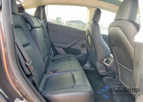 2024 Tesla Model Y from USA, damaged, VIN 7SAYGDED7RF112734